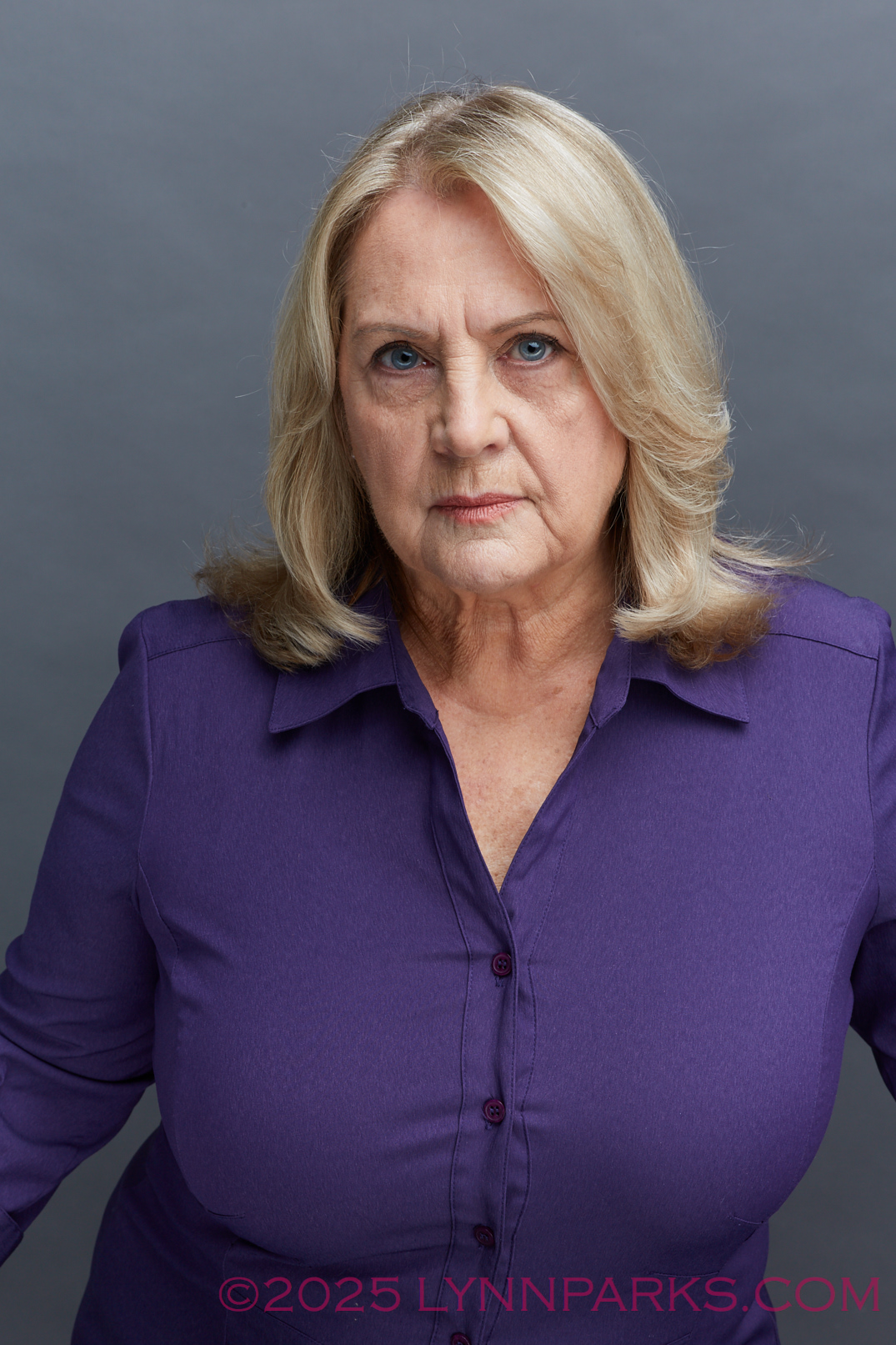 Cookie Colletti actor headshot wearing purple shirt